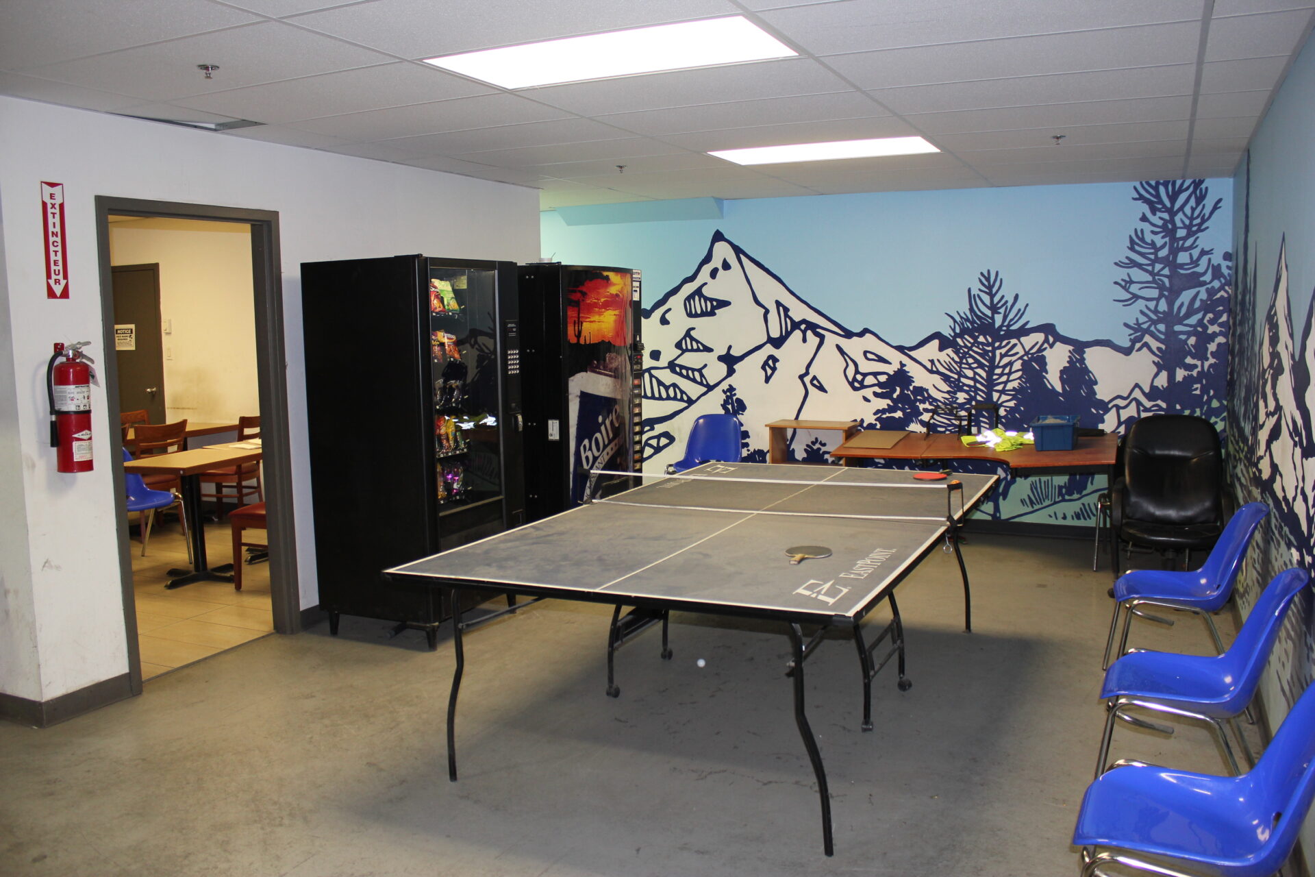 Industrial building 7500 Cote de Liesse for sale. Warehouse mezzanine feature a ping pong area